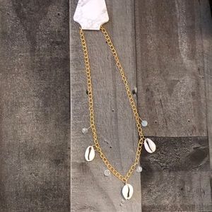 Gold tone chain puka shell and bead necklace